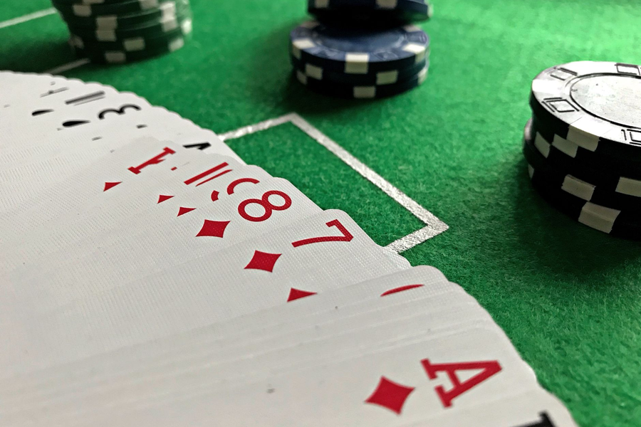 Elegant themed table with cards prepared for a hosted evening