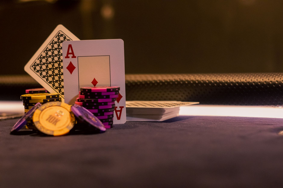 Cards and symbolic chips arranged on a table